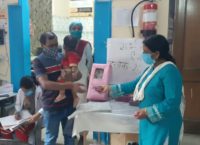 ANM distributing contraceptive at Maharajpur UPHC, Ghaziabad, UP, India 